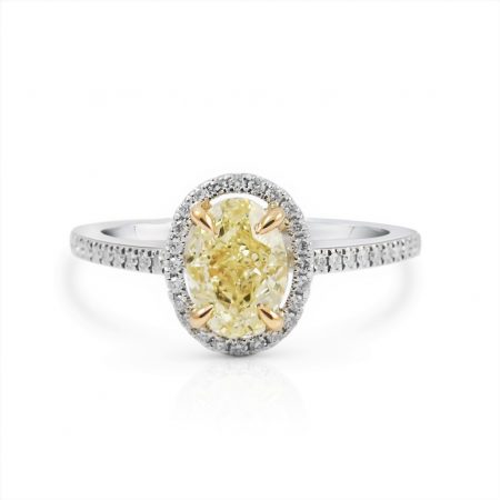 Oval yellow diamond halo engagement ring