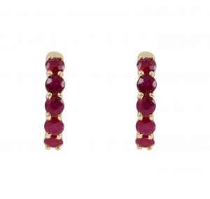 set of ruby hoops in 18k yellow gold set in a claw setting with ten rubies in total