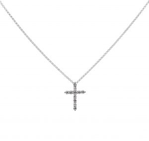 An 18K white gold mini diamond cross pendant claw set  with 11 round brilliant cut diamonds. Chain included 42cm in length. Carat: 11 = 0.25ct