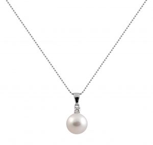 A Classic South Sea pearl pendant set in 18K White Gold featuring a round brilliant cut diamond at the bail. A simplistic design easily matched with. Chain is sold separately.. Pearl size: 1 = 10mm Carat: 1 = 0.10ct