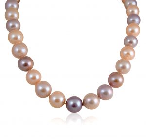 Fresh water pink pearl strand necklace, strung with 11 -13mm round dyed pearls indifferent rays of pink and mauve. Producing a Good Lustre and reflection.