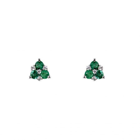 A pair of trilogy emerald gemstone studs set in 18K white gold, featuring six emeralds in total and eight diamonds in a claw setting. CARAT: Emerald 6 = 0.30ct Diamonds 8 = 0.06ct