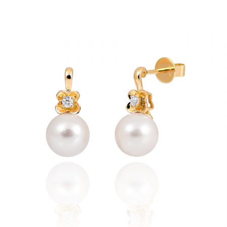 pearl and diamond stud earrings in yellow gold